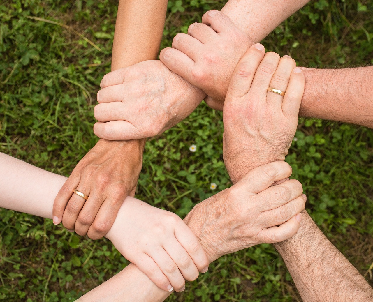 Team spirit — people together, like committee, office, and flats working as one society